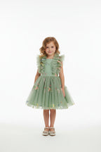 Green dress with floral embroidery and ruffled sleeves on a model with a white background