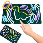 Children's maze board with colorful pathways and a hand interacting with it.