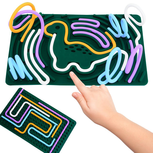 Children's maze board with colorful pathways and a hand interacting with it.