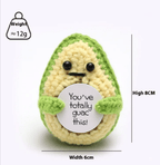 Crocheted avocado plush toy with a humorous message on a white background