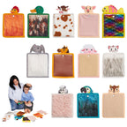 Collection of animal-themed soft toys with a woman and child playing below.