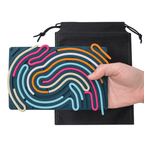 Colorful silicone bread shapes on a black drawstring bag with a hand holding them.