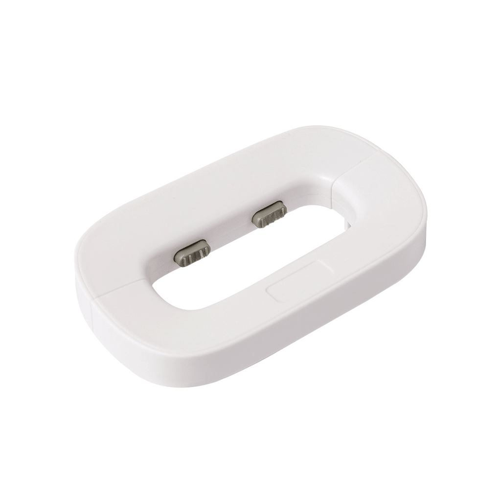 White oval-shaped device with two small lights on a white background