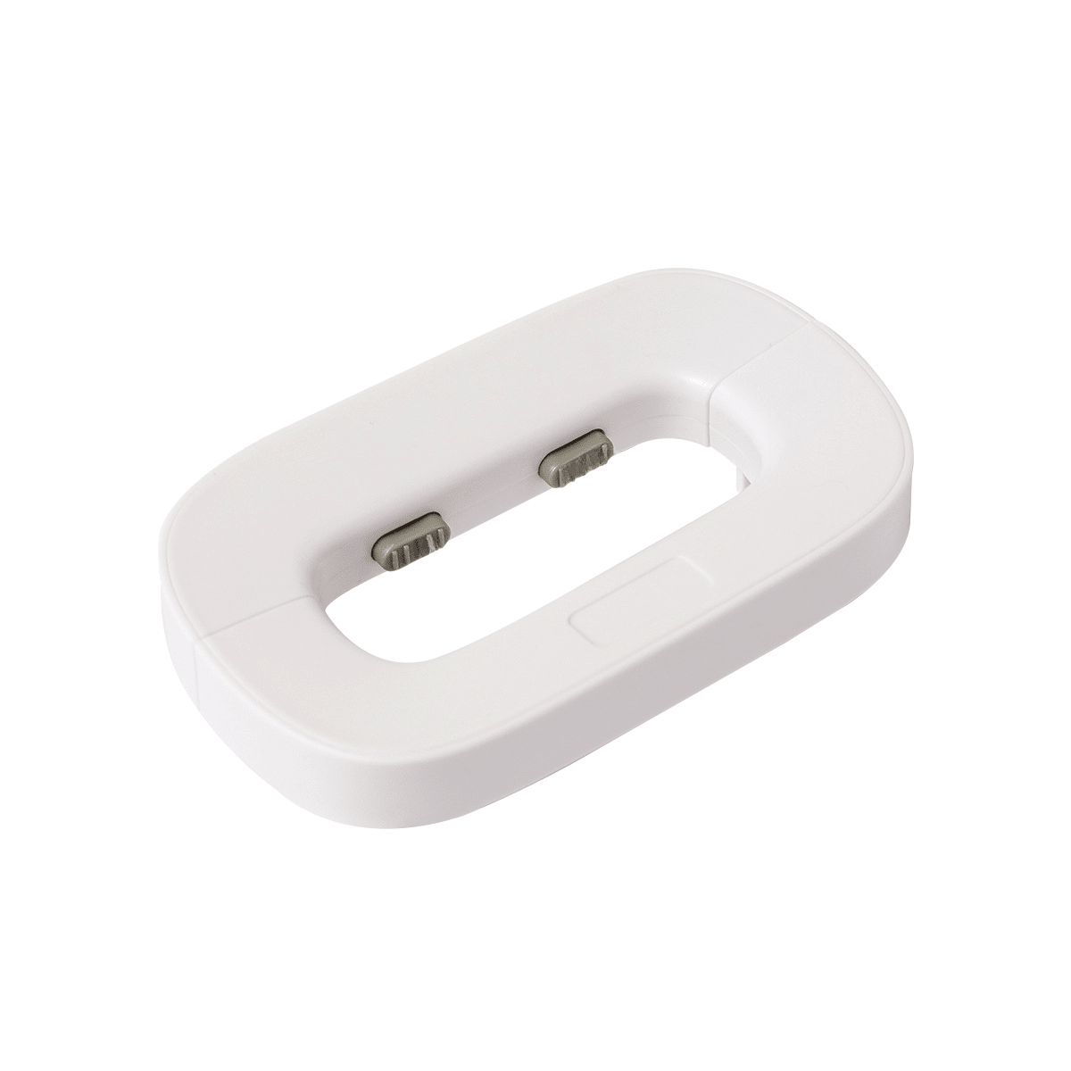 White oval-shaped device with two small lights on a white background