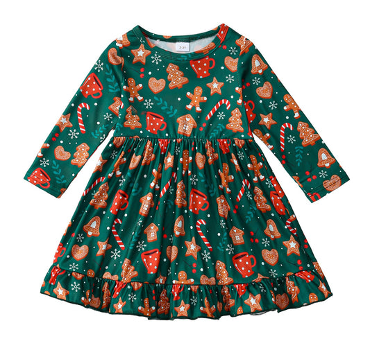 Christmas-themed dress with gingerbread men, candy canes, and mugs on a green background
