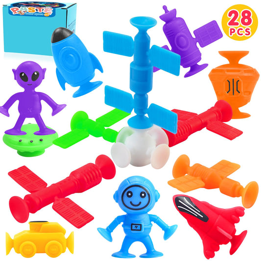 Assorted colorful toys including a blue alien figure, red airplane, and other shapes on a white background.  "Suction cup bath toys 28 pack for toddlers – front view"
