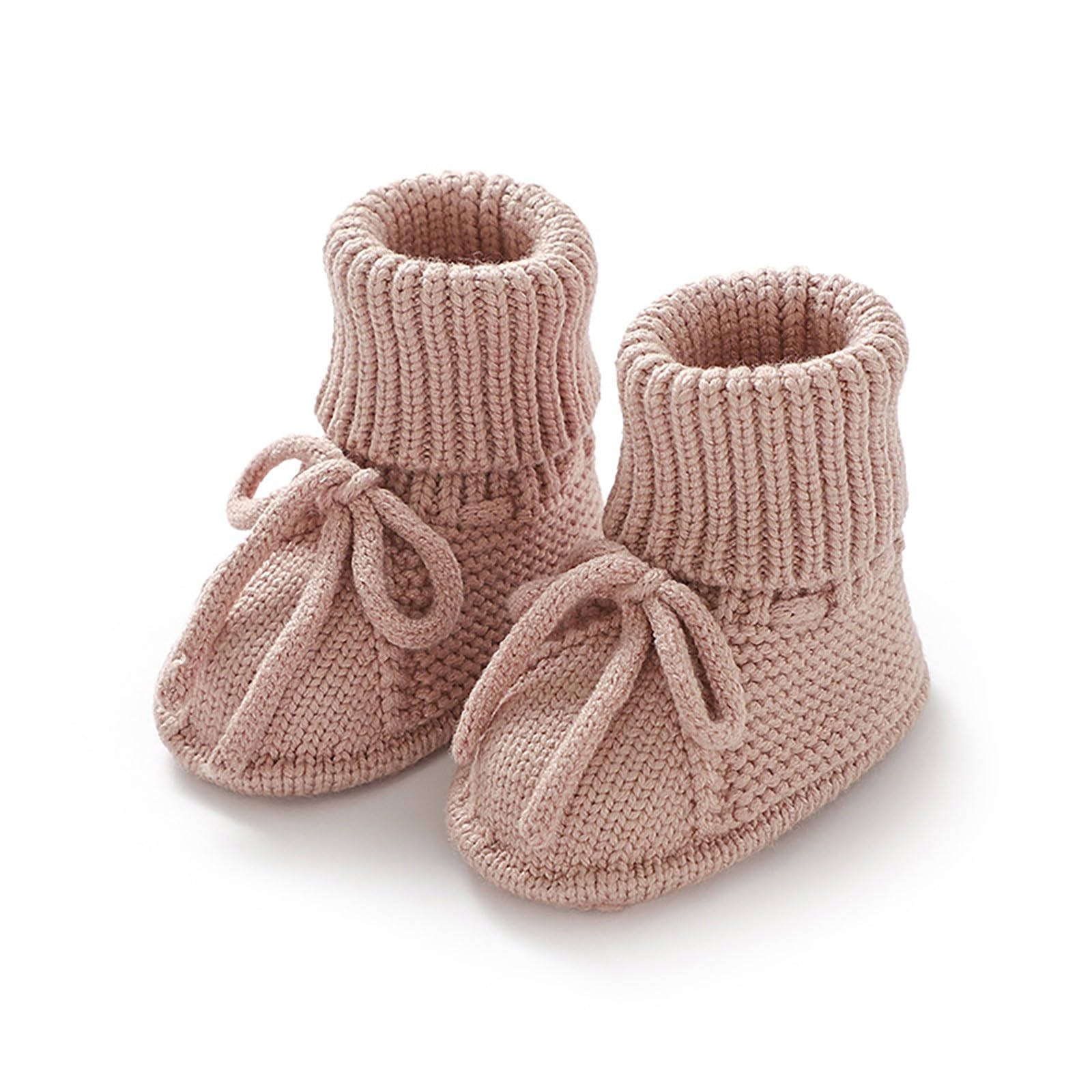 Pair of pink knitted baby booties on a white background